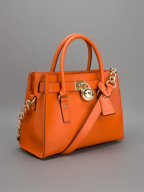 michael kors orange purses